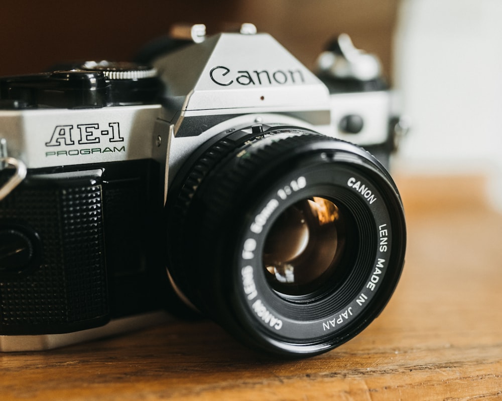 a camera sitting on top of a wooden table