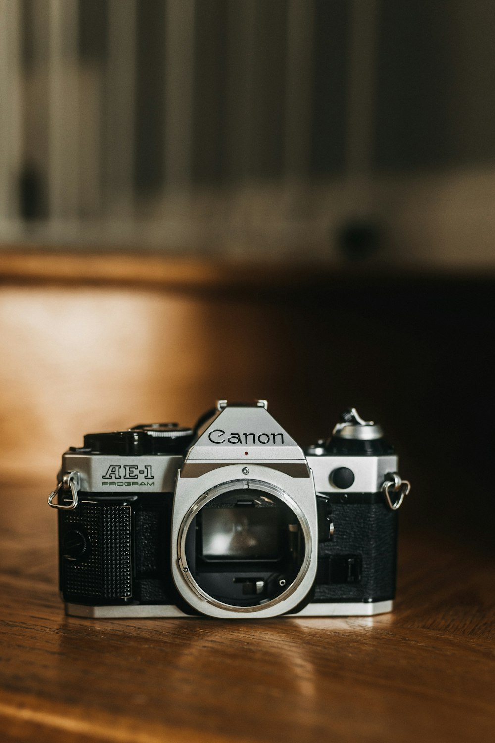 a camera sitting on top of a wooden table