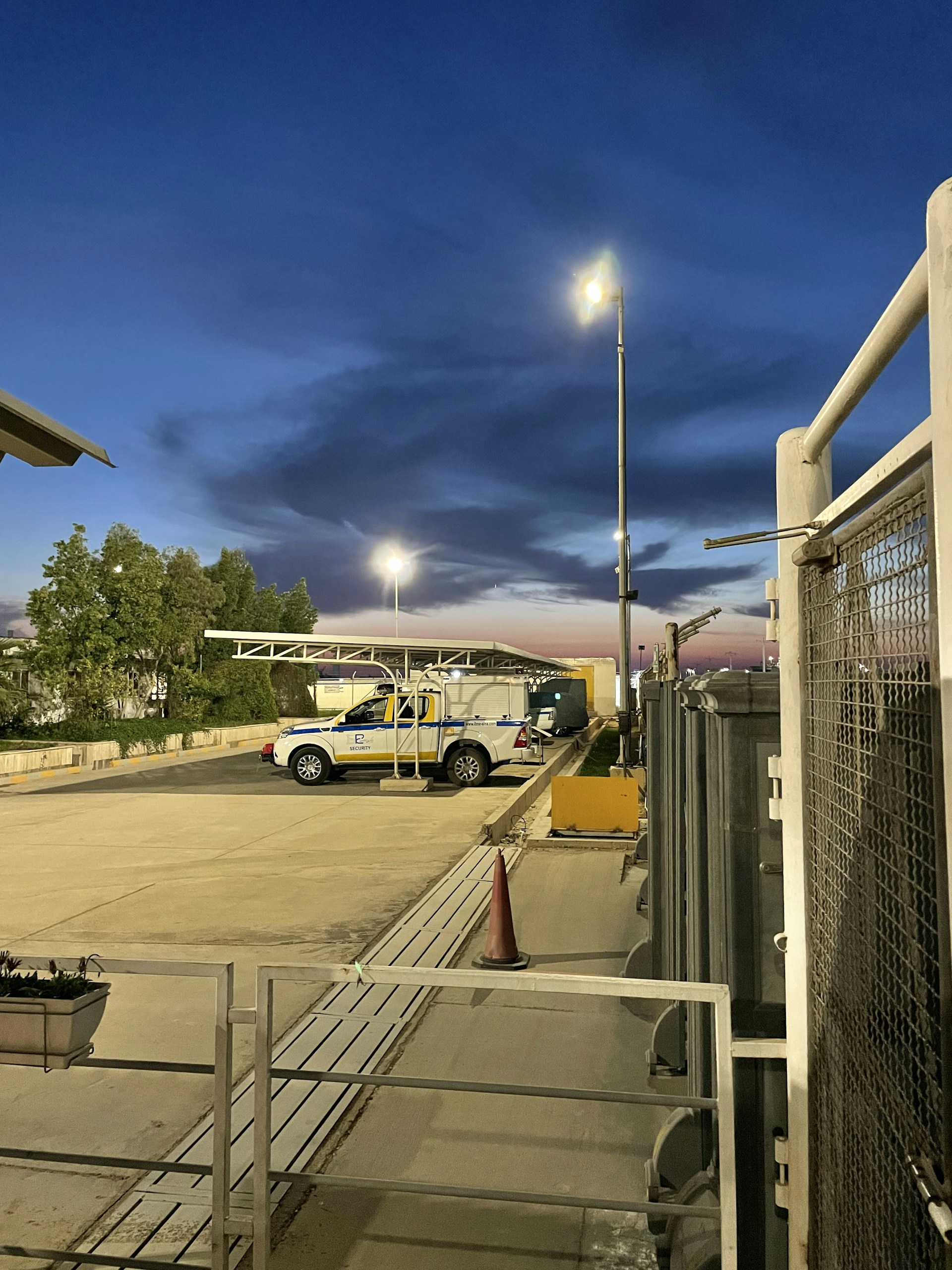 woman wearing yellow long-sleeved dress under white clouds and blue sky during daytime