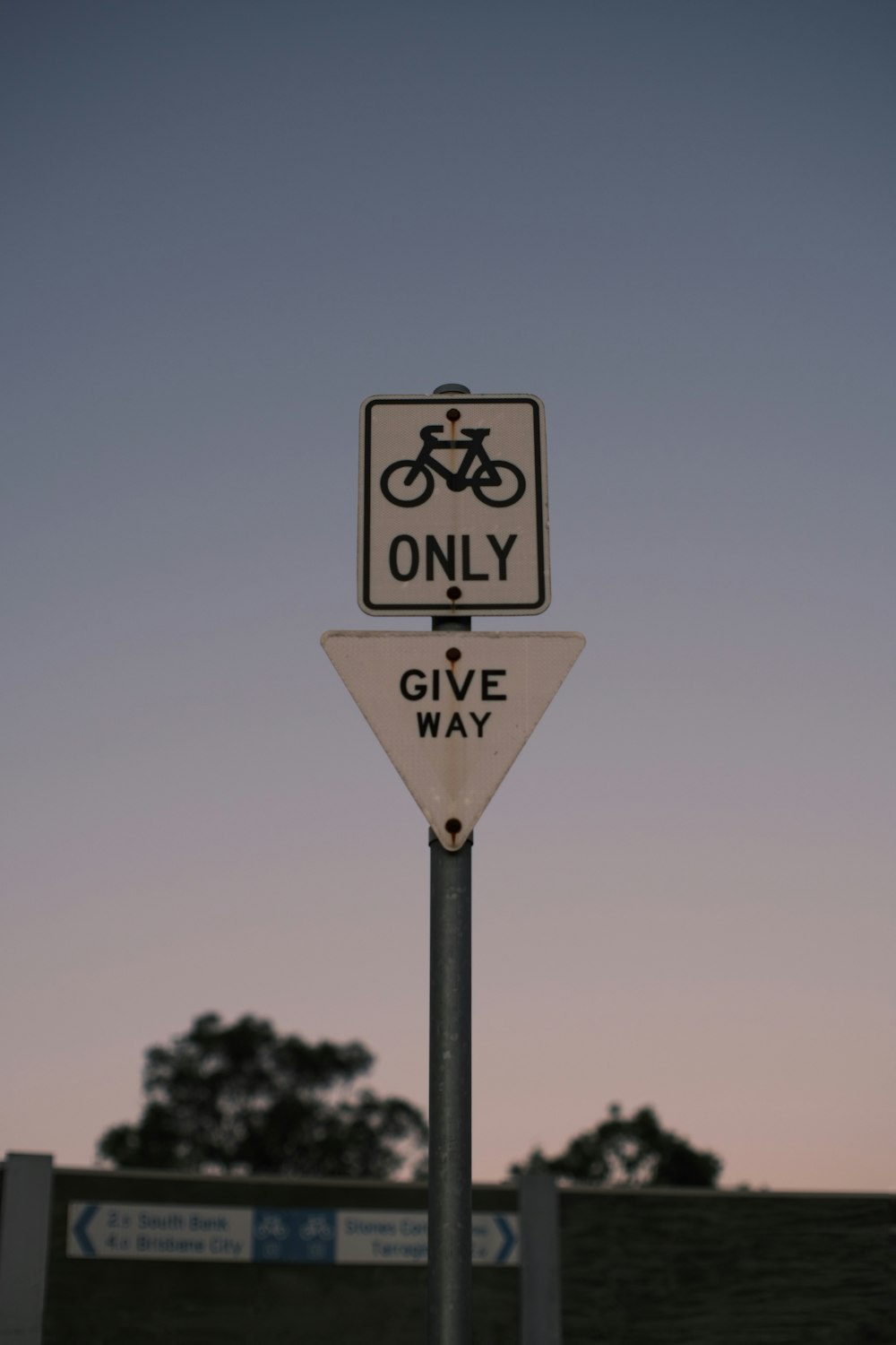 a street sign that says only give way