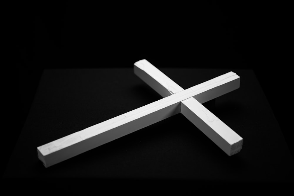 a white cross on a black background