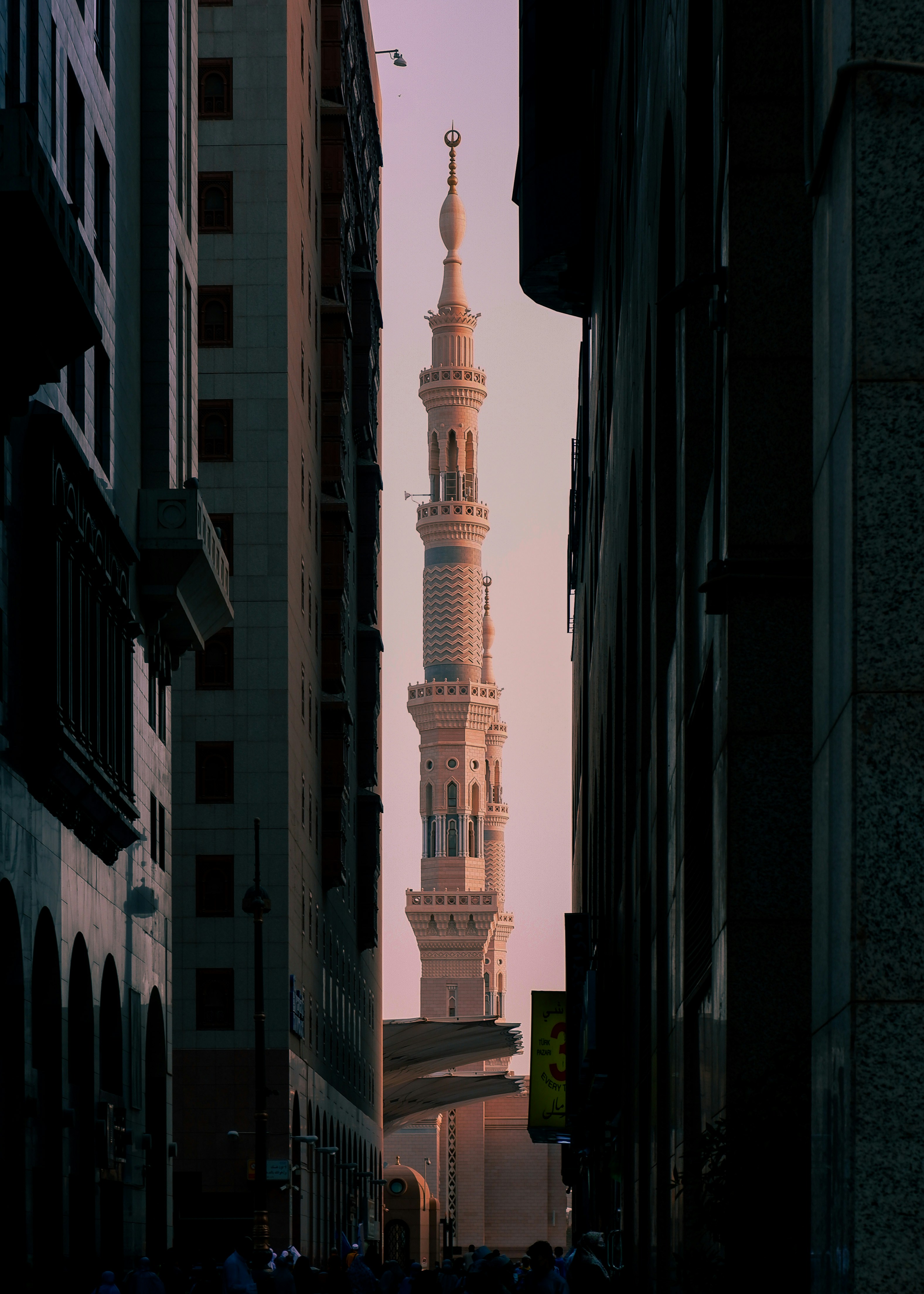 a tall building with a clock on it's side