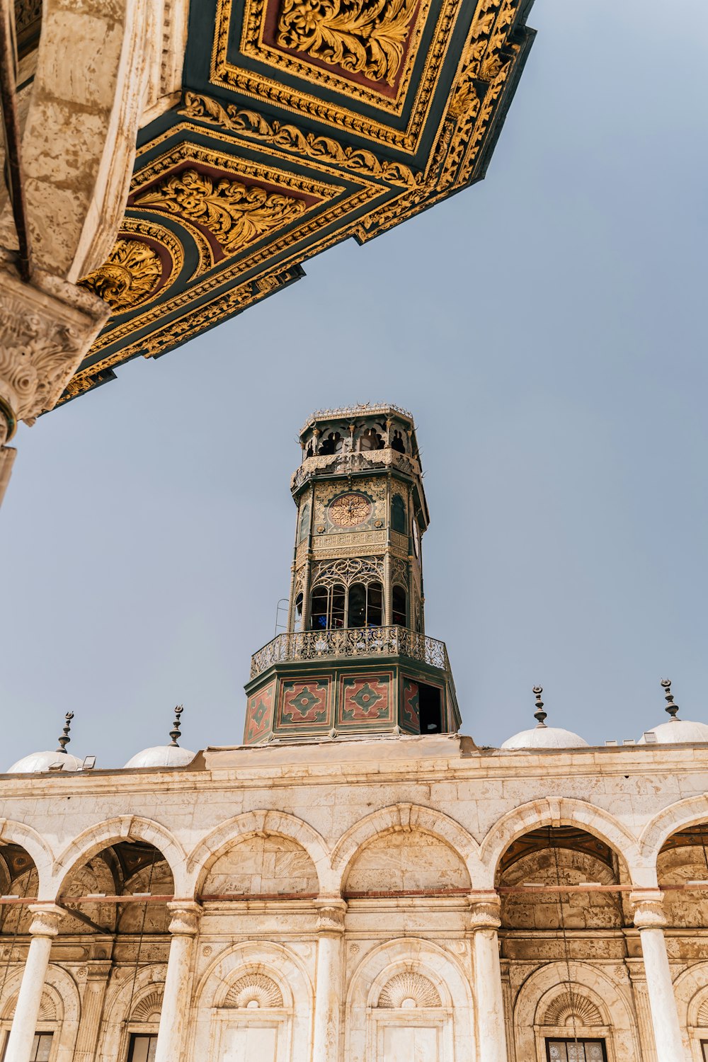 a tall tower with a clock on top of it