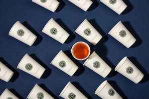 A variety of branded cups showcasing different designs.