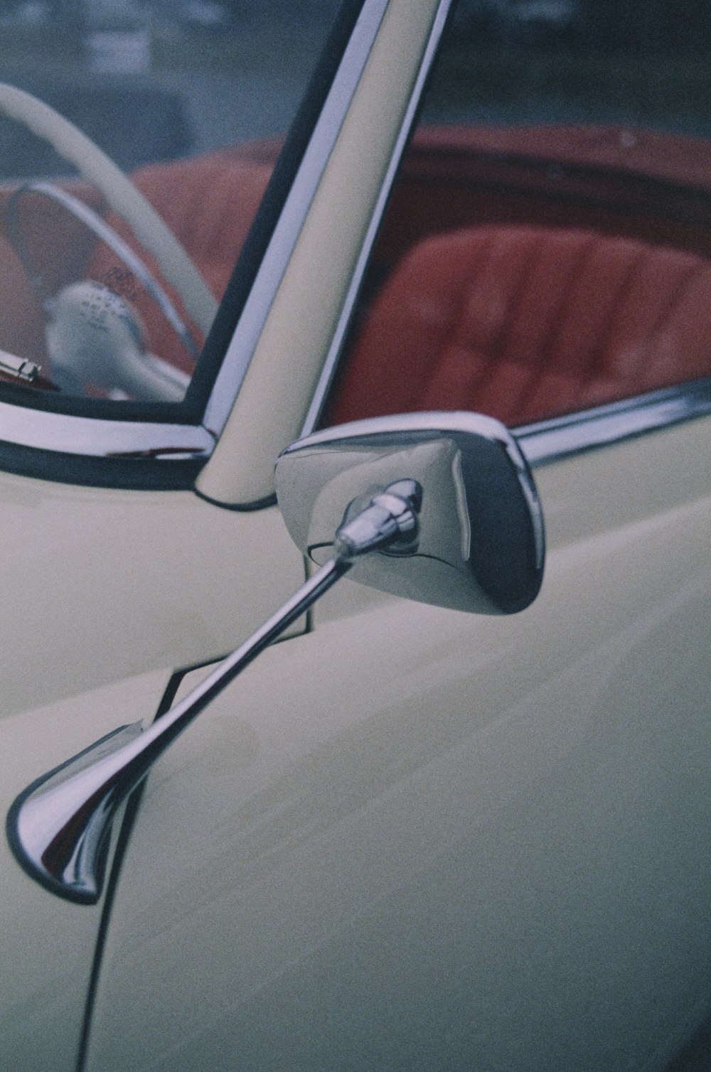 a close up of a car's side view mirror