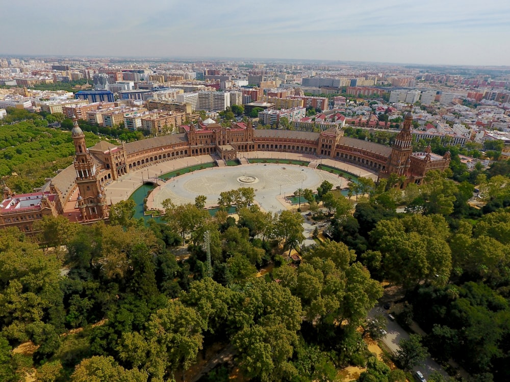 a bird's eye view of a city with a circular building