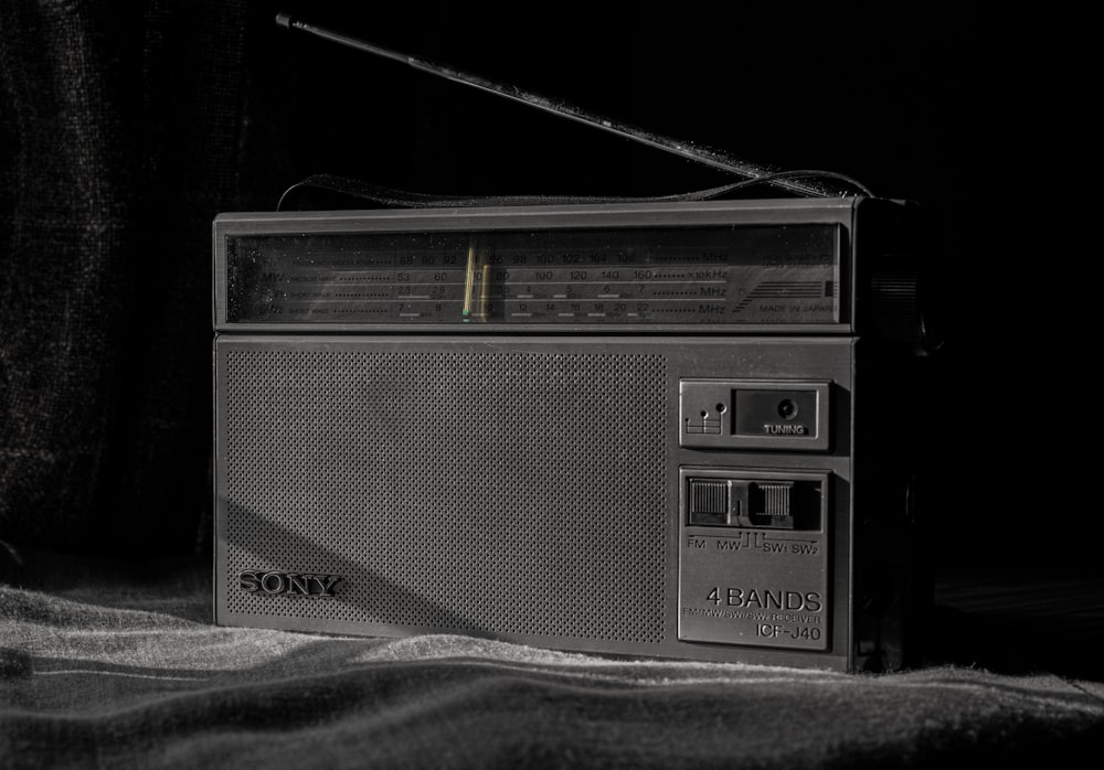 a black and white photo of an old radio