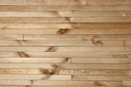 a close up view of a wooden wall
