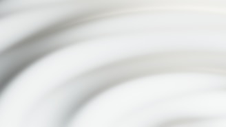 Soft gradients blending into sleek, modern shapes.