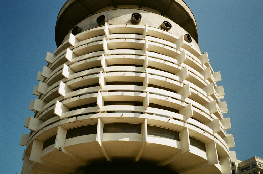 a very tall building with a clock on the top of it