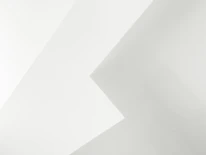 Clean geometric lines forming a subtle tech-inspired pattern in gentle white and gray.