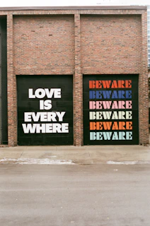 a couple of garage doors that have some words on them