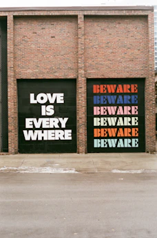 a couple of garage doors that have some words on them