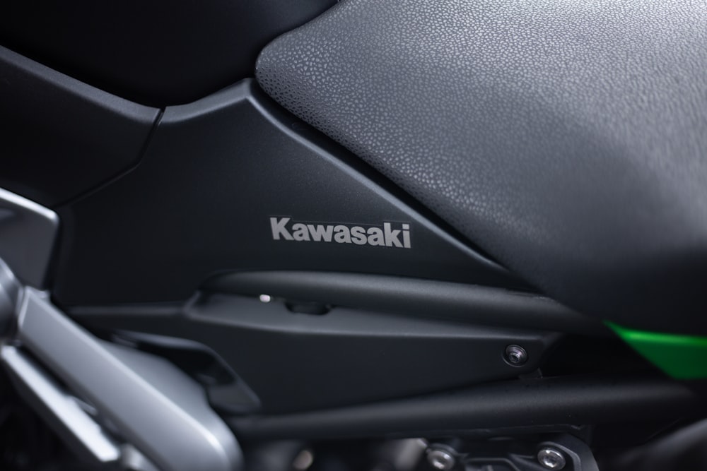 a close up of the kawasaki logo on a motorcycle