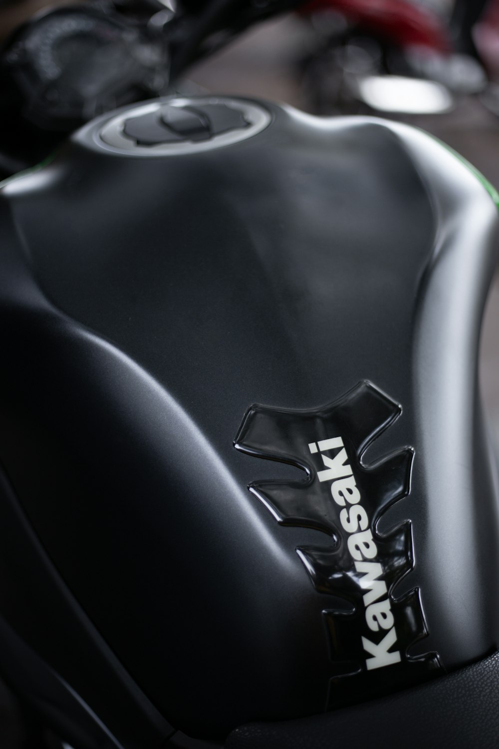 a close up of a motorcycle with a logo on it