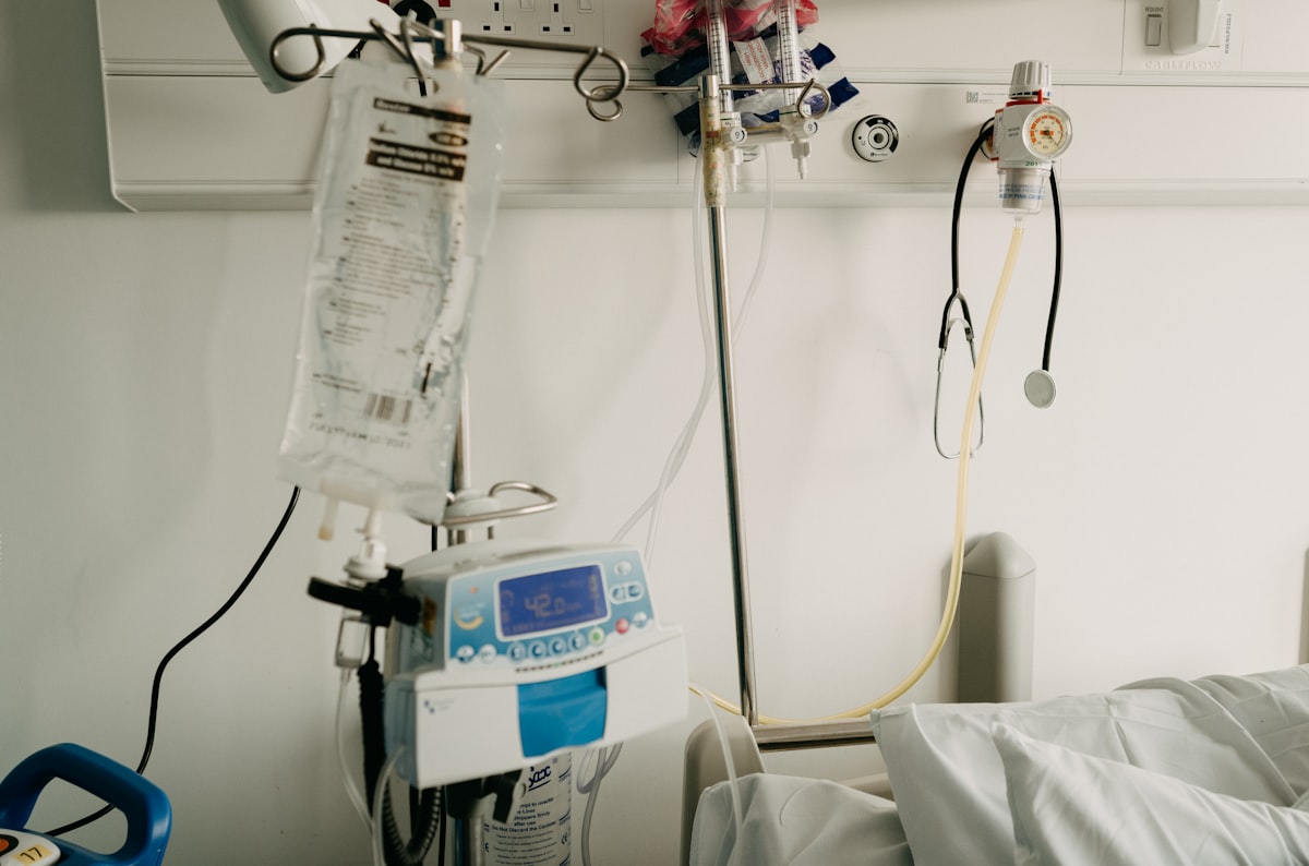 AI tools for ICU nurses 2026 - intensive care unit room with bed and monitoring equipment