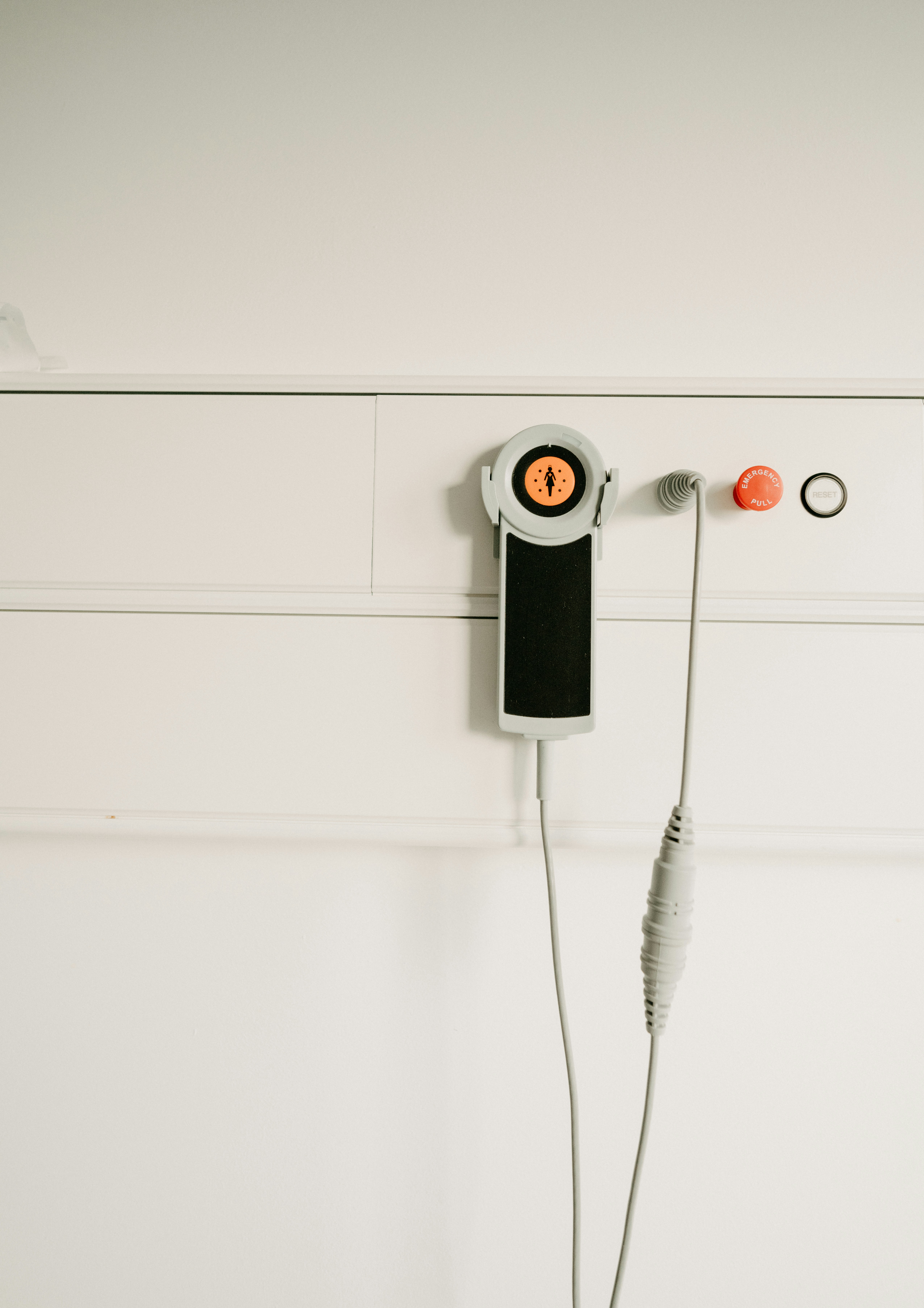 a pair of headphones attached to a wall