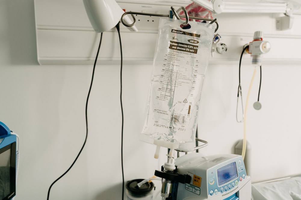 a hospital room with a monitor and medical equipment