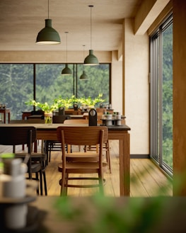 a dining room with a table and chairs