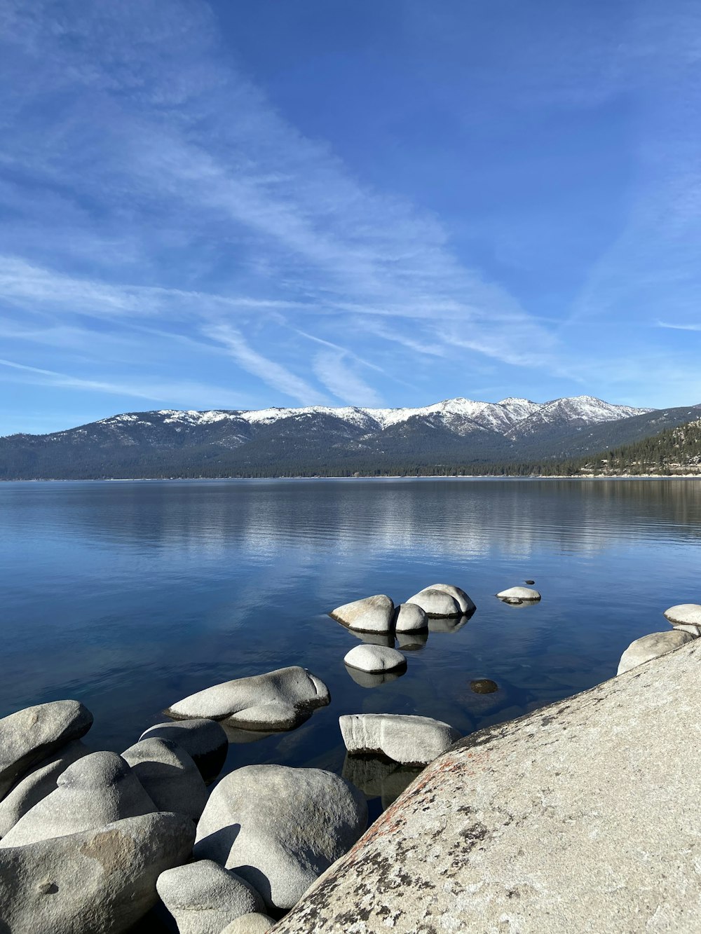 a large body of water surrounded by rocks