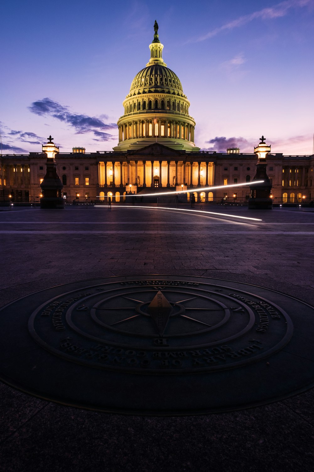 the capitol building is lit up at night