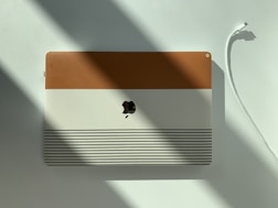 an apple product is shown on a white surface