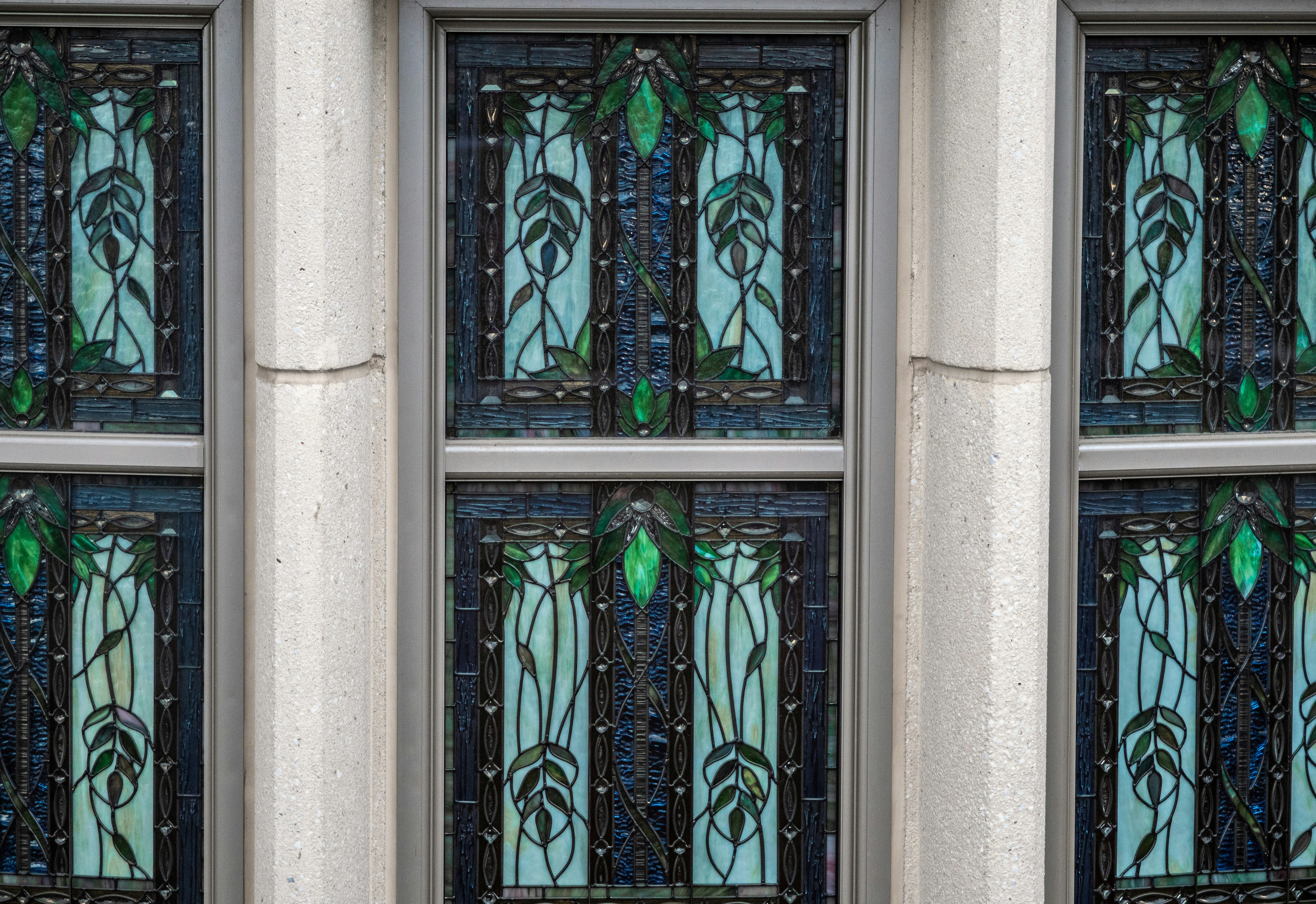 Decorative glass options for custom entry doors, showcasing intricate patterns and textures - custom entry doors residential