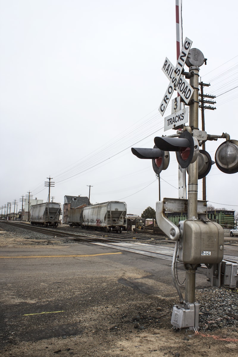 railroad crossing, railway crossing gates, train tracks, commuter train Japan, crossing warning lights