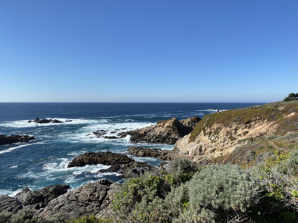 a view of the ocean from a cliff