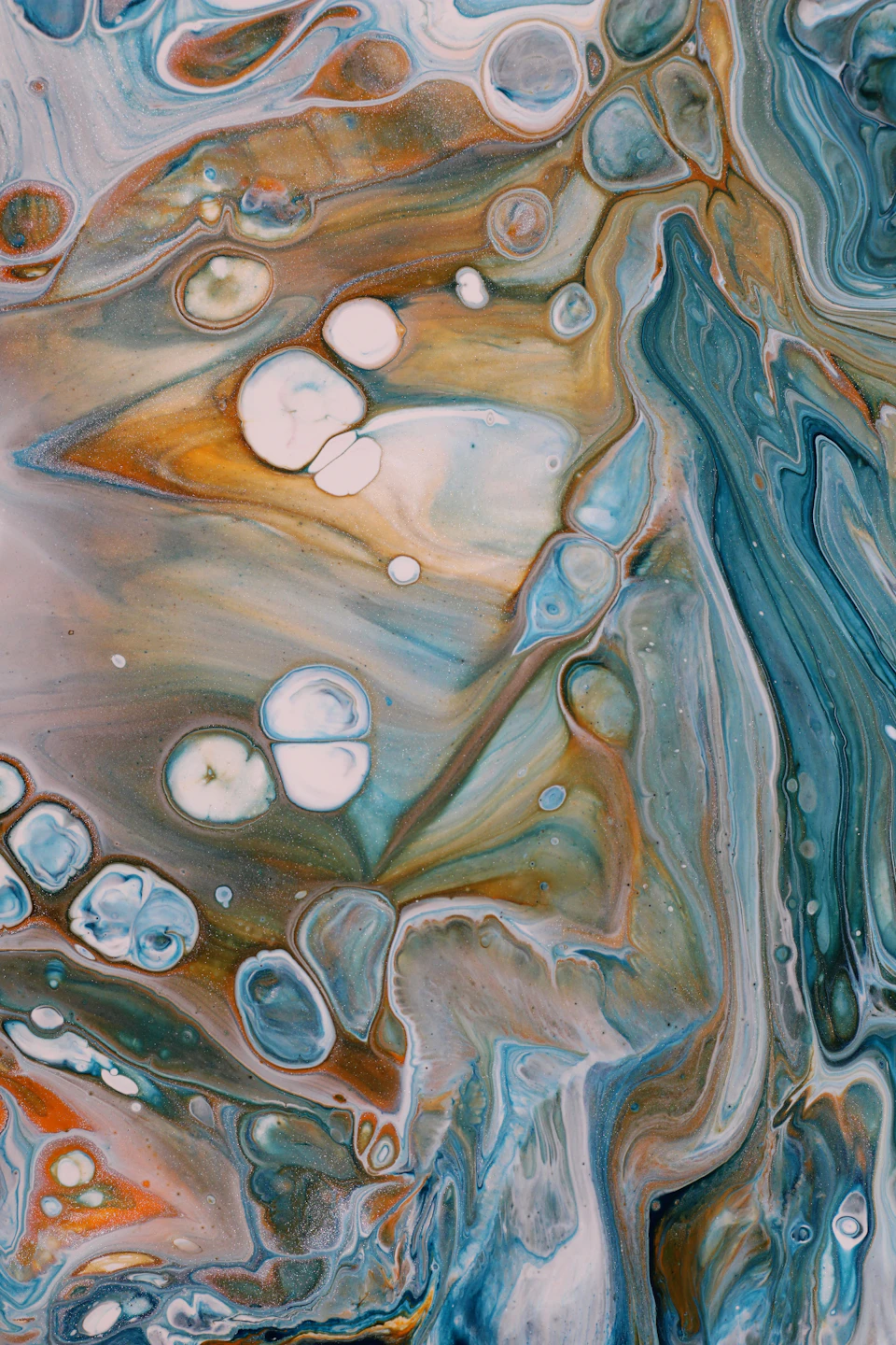 Abstract painting features intricate patterns with floating small dots or circles in blue and brown