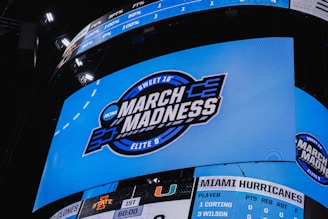the march madness logo is displayed on the side of a building