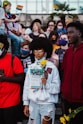 a group of people standing next to each other