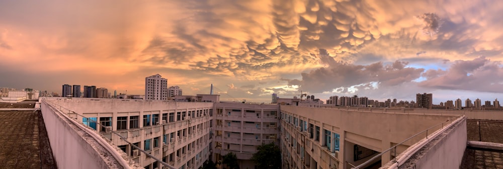 a view of a cloudy sky over a city