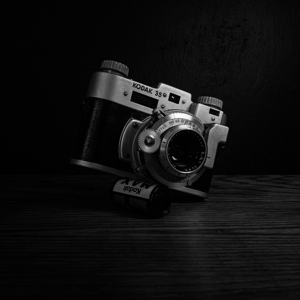 a black and white photo of a camera