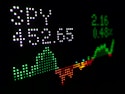 digital stock ticker chart symbolizing investments and investing in stocks, bonds, etfs, and more