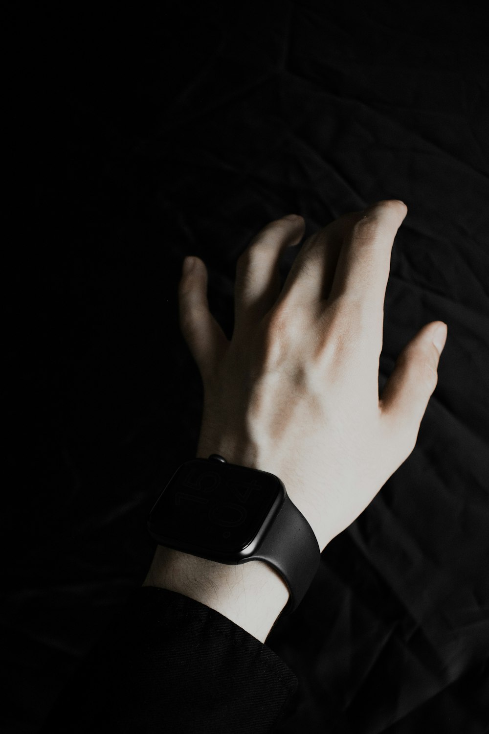 a person's hand with a watch on their wrist