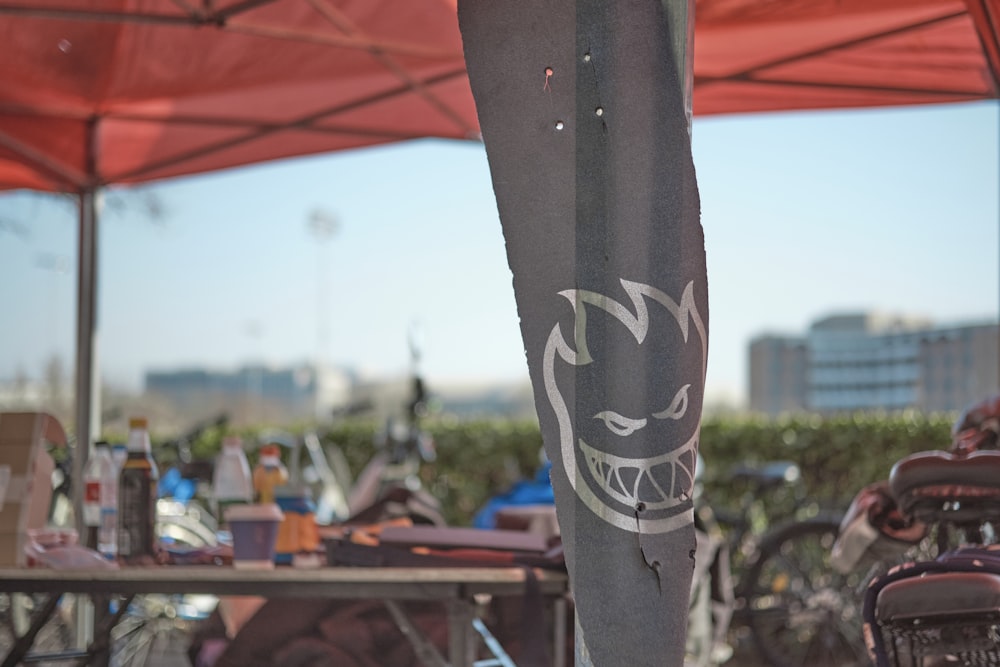 a group of bikes parked under a red tent