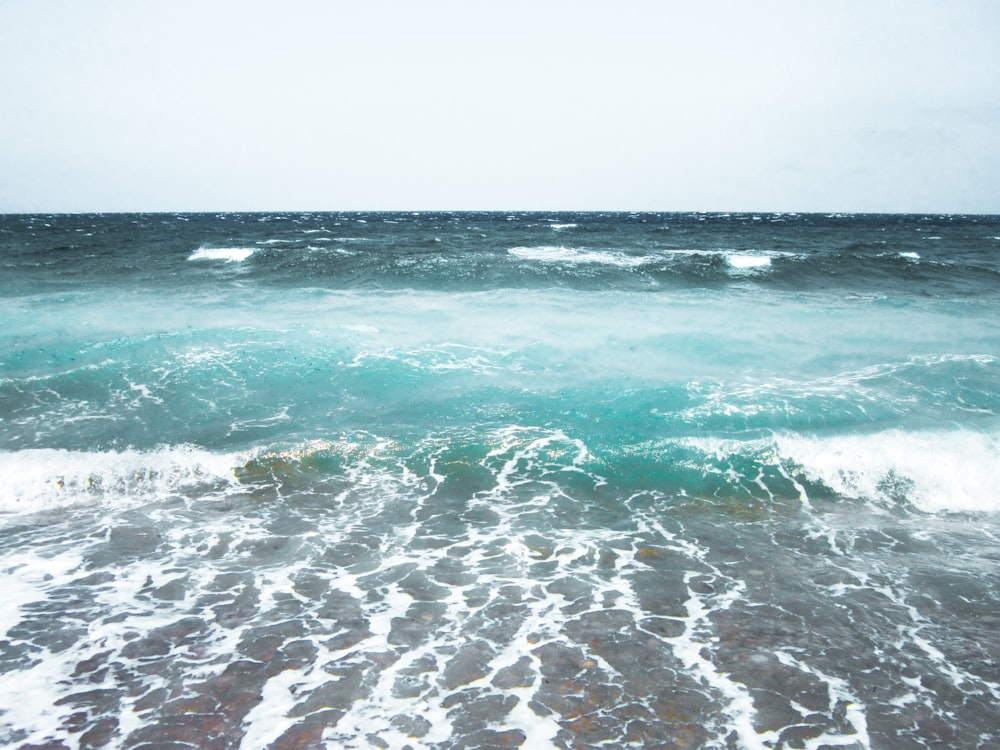 a view of the ocean from the shore