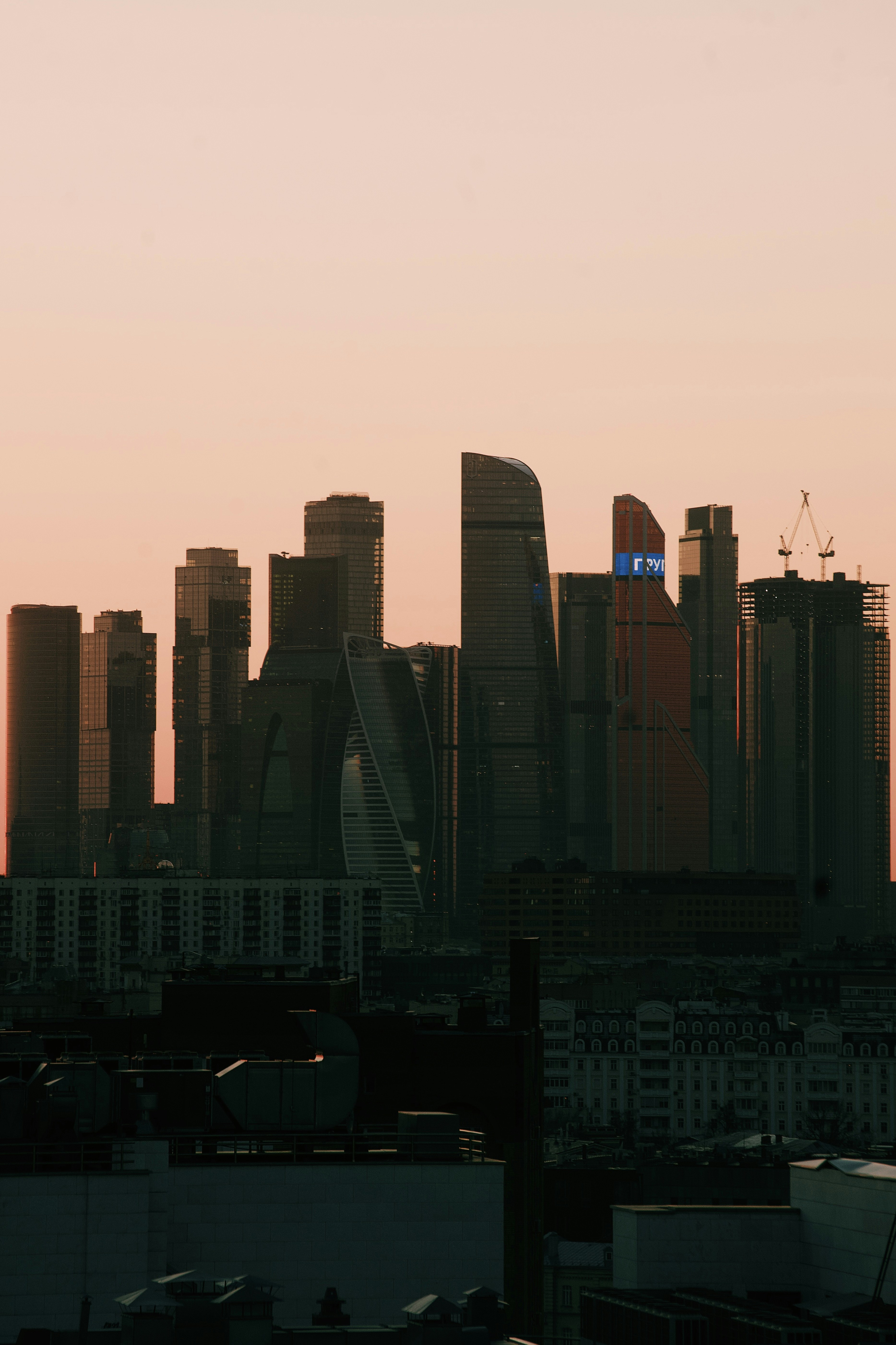 a large body of water with a city in the background