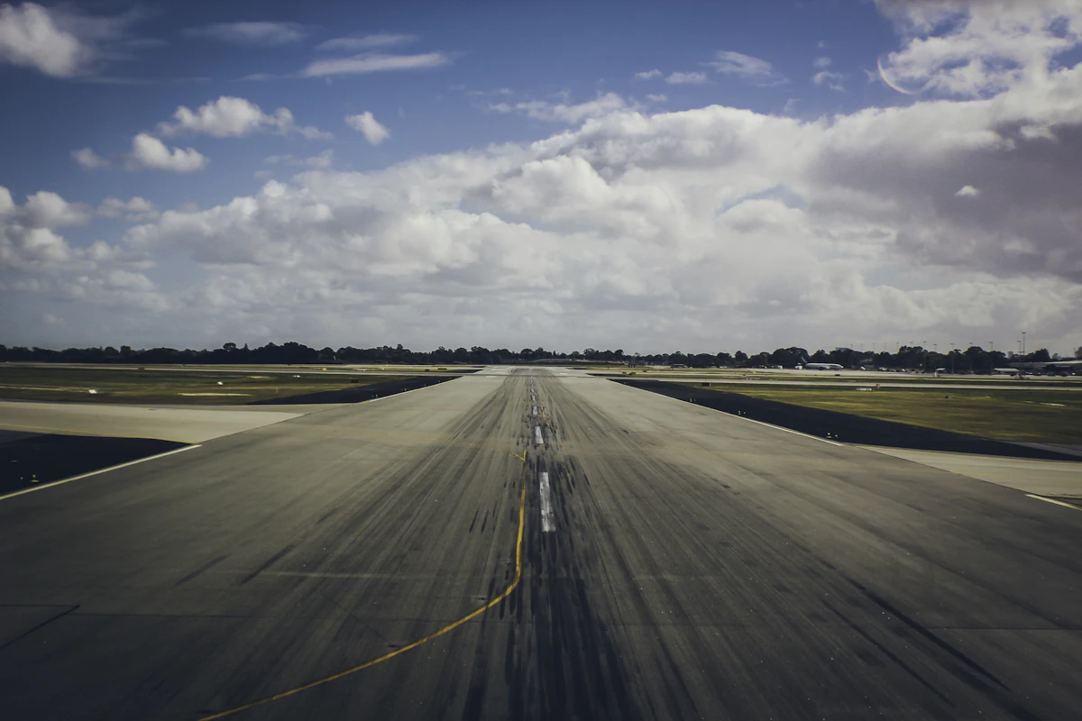 Airplane taking off from an airport runway