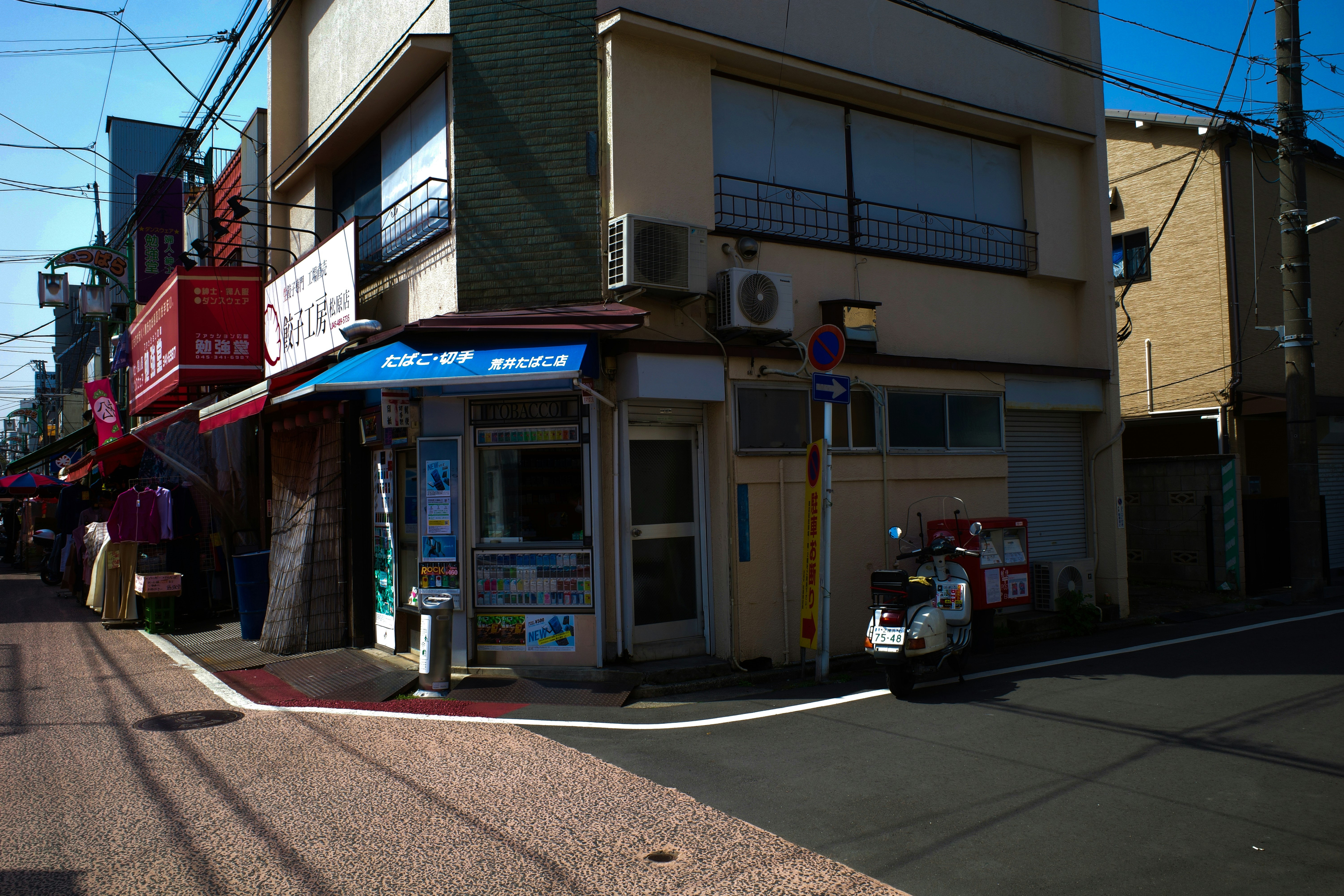 a motorcycle parked in front of a store