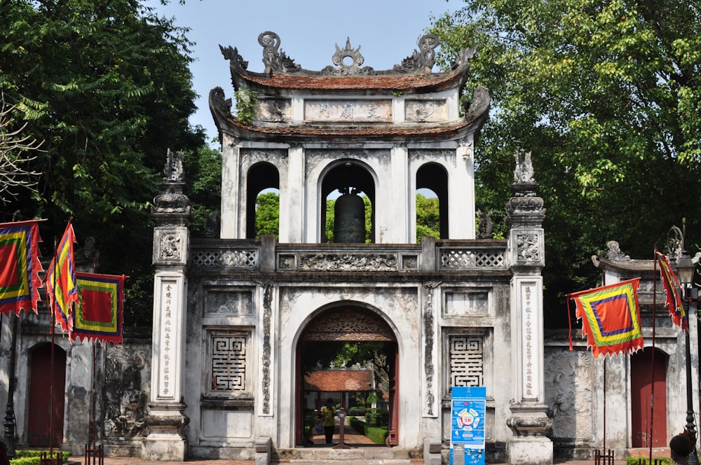 an old building with a clock tower in the middle of it