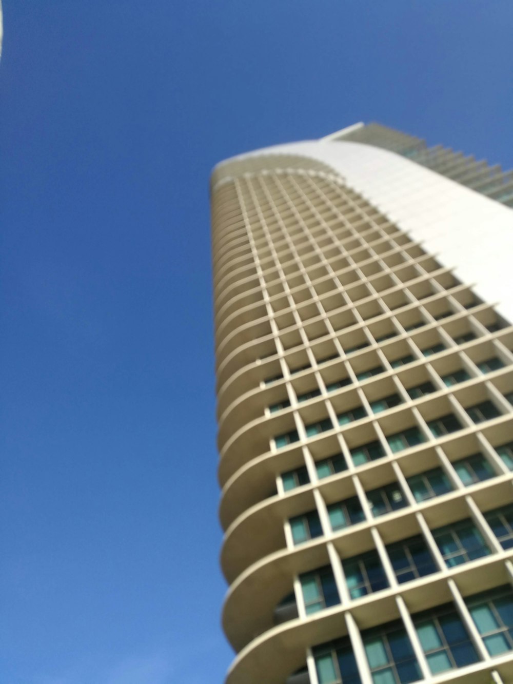 a tall building with a clock on the side of it