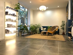 Cozy home decor items arranged neatly with black and blue color highlights