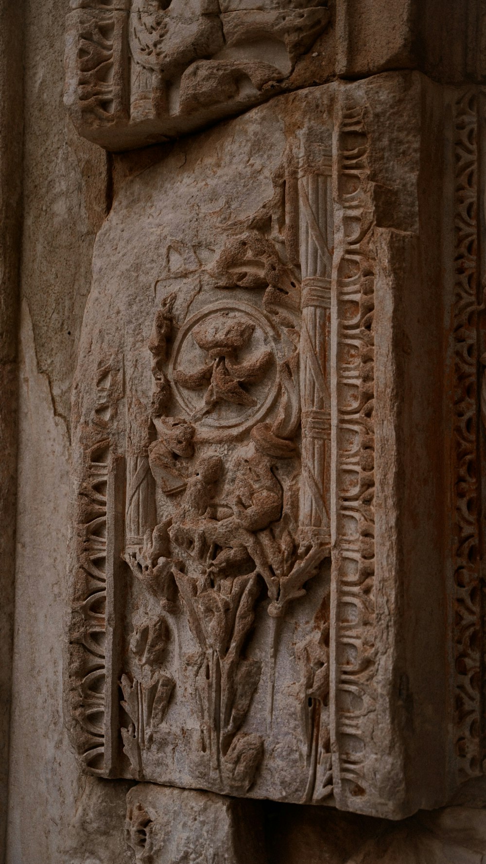 a carving on the side of a building