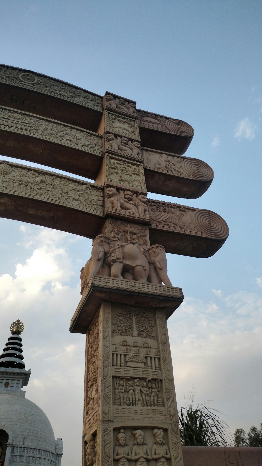 a large wooden structure with carvings on it