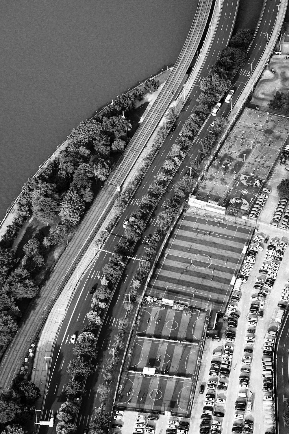 a black and white photo of an aerial view of a highway
