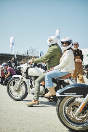 Community members gathered outdoors during a riding safety workshop.