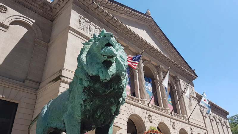 Bronze lion statue in front of the Art Institute of Chicago