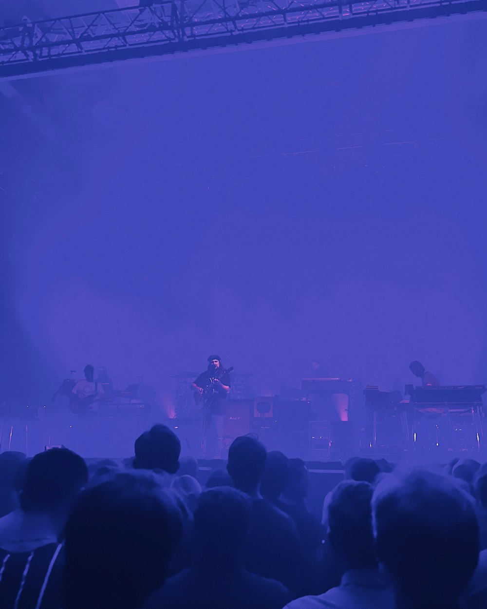 a group of people standing on top of a stage